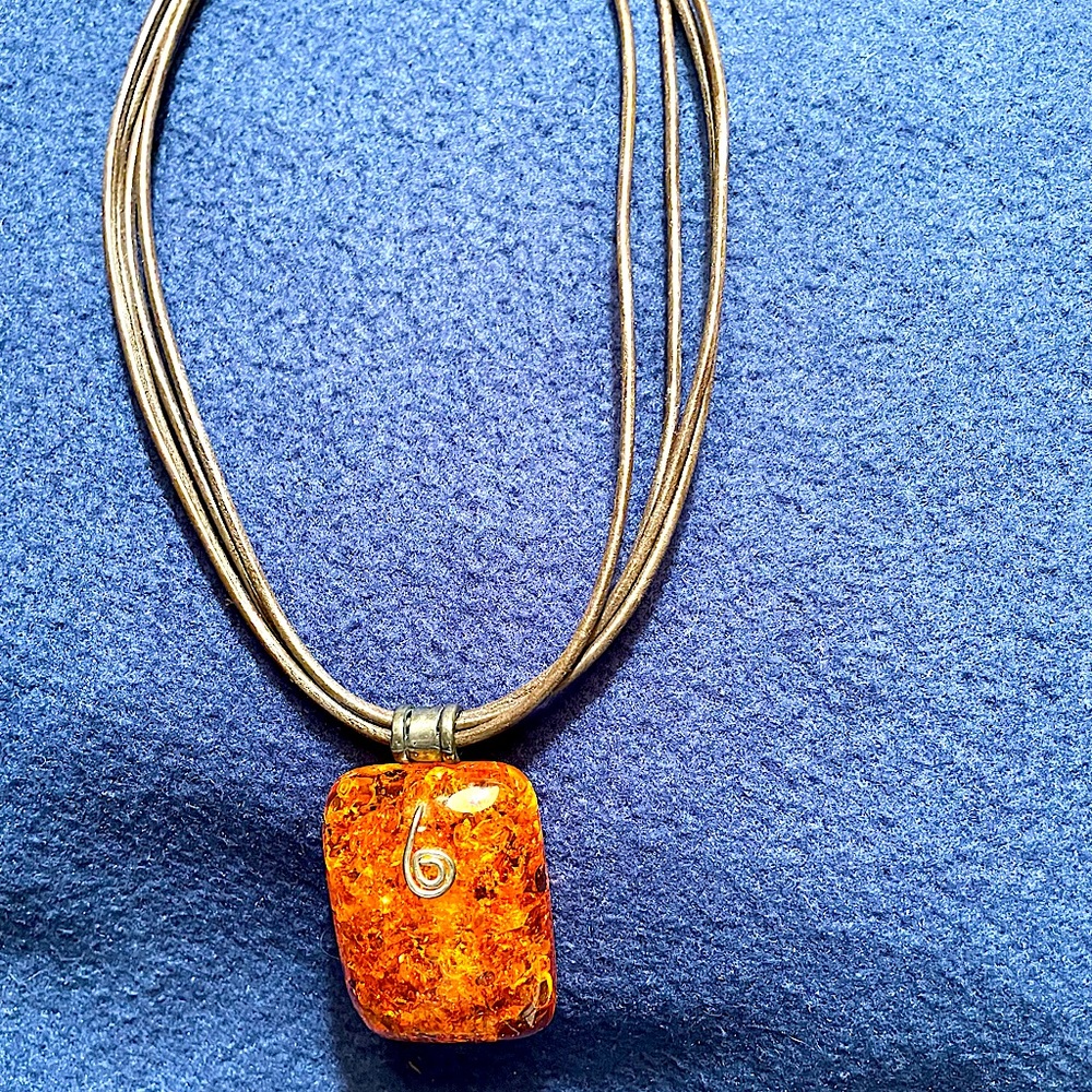 Vintage Coldwater Creek pendant necklace. Beautiful Amber color on faux leather